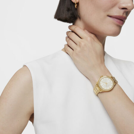 Reloj analógico T-Shine de acero IP dorado con zirconias cúbicas